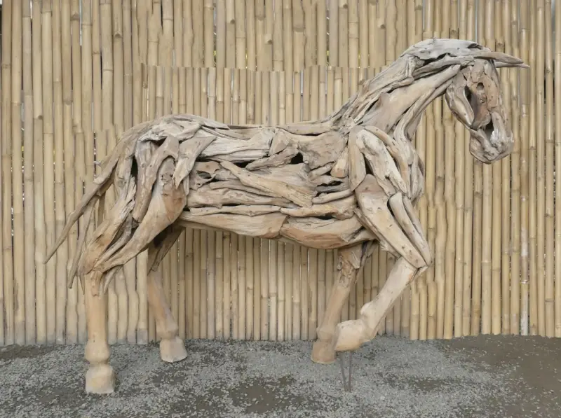 Product image 1 of the product “Horse in one piece, the head is from one piece of wood and carved head. The size is sbout 240cm lenght and 165cm height. ”